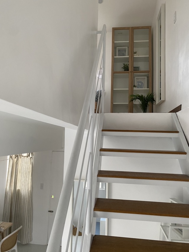 Staircase inside a furnished Brentwood model home